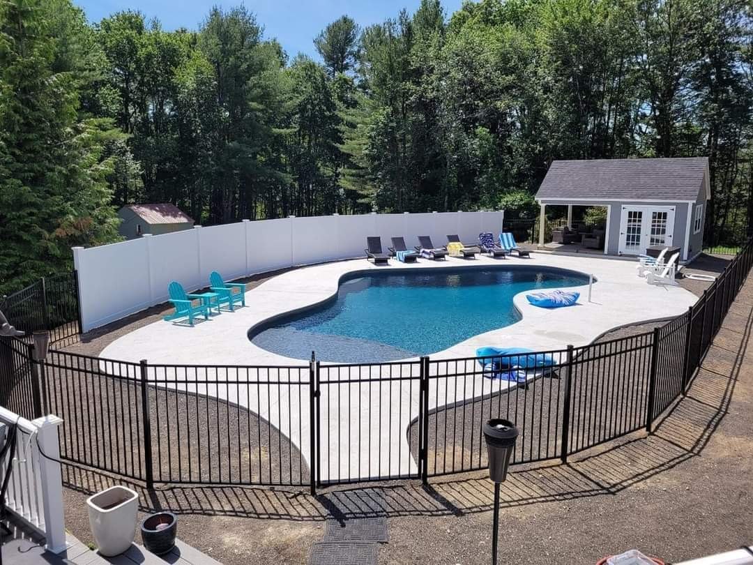 Black ornamental aluminum pool fence installed by Sullivan & Sons Fence